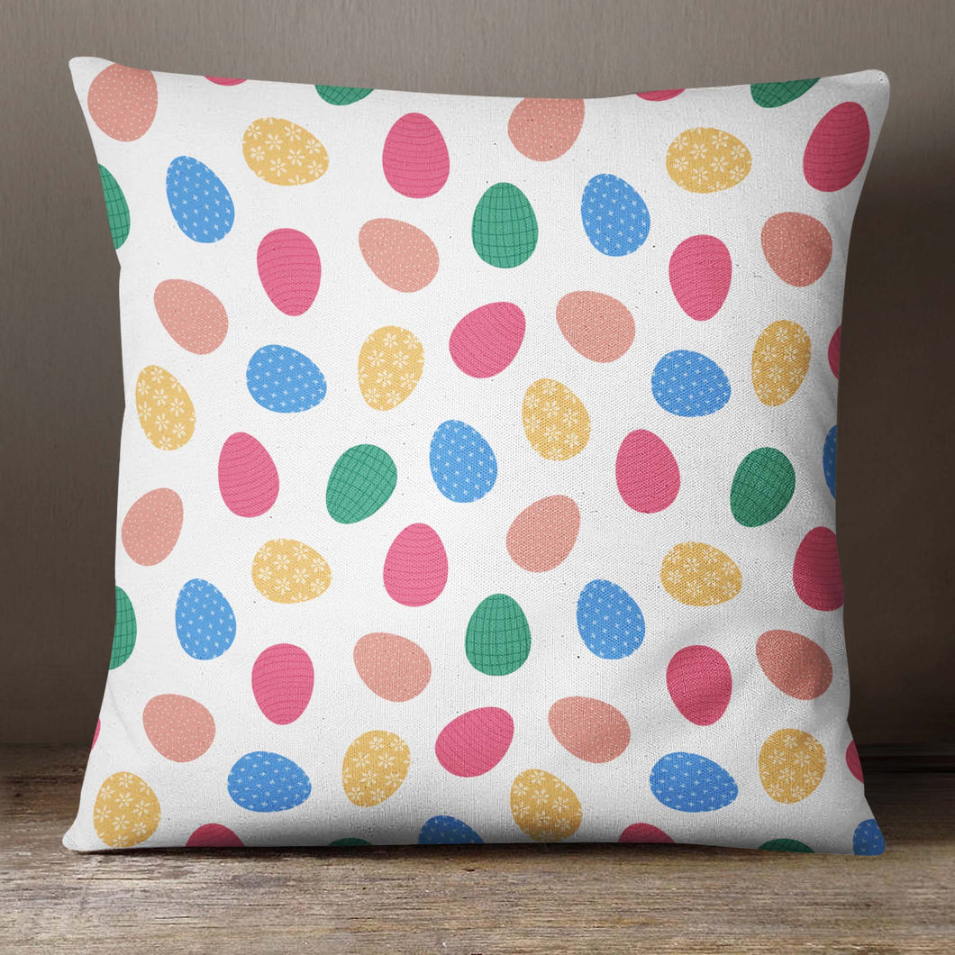 An Easter pillow cover featuring a pattern of colorful Easter eggs. The design is printed on both sides of the cover and is visible from any angle. The cover is made from high-quality, durable fabric and features a convenient zipper closure. It measures 18