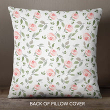 Load image into Gallery viewer, Pillow cover featuring a delicate and intricate design of pink blossoms and green leaves on a white background. The pattern is symmetrical and covers the entire back side of the pillow cover. A zipper allows for easy insertion and removal of a pillow insert.
